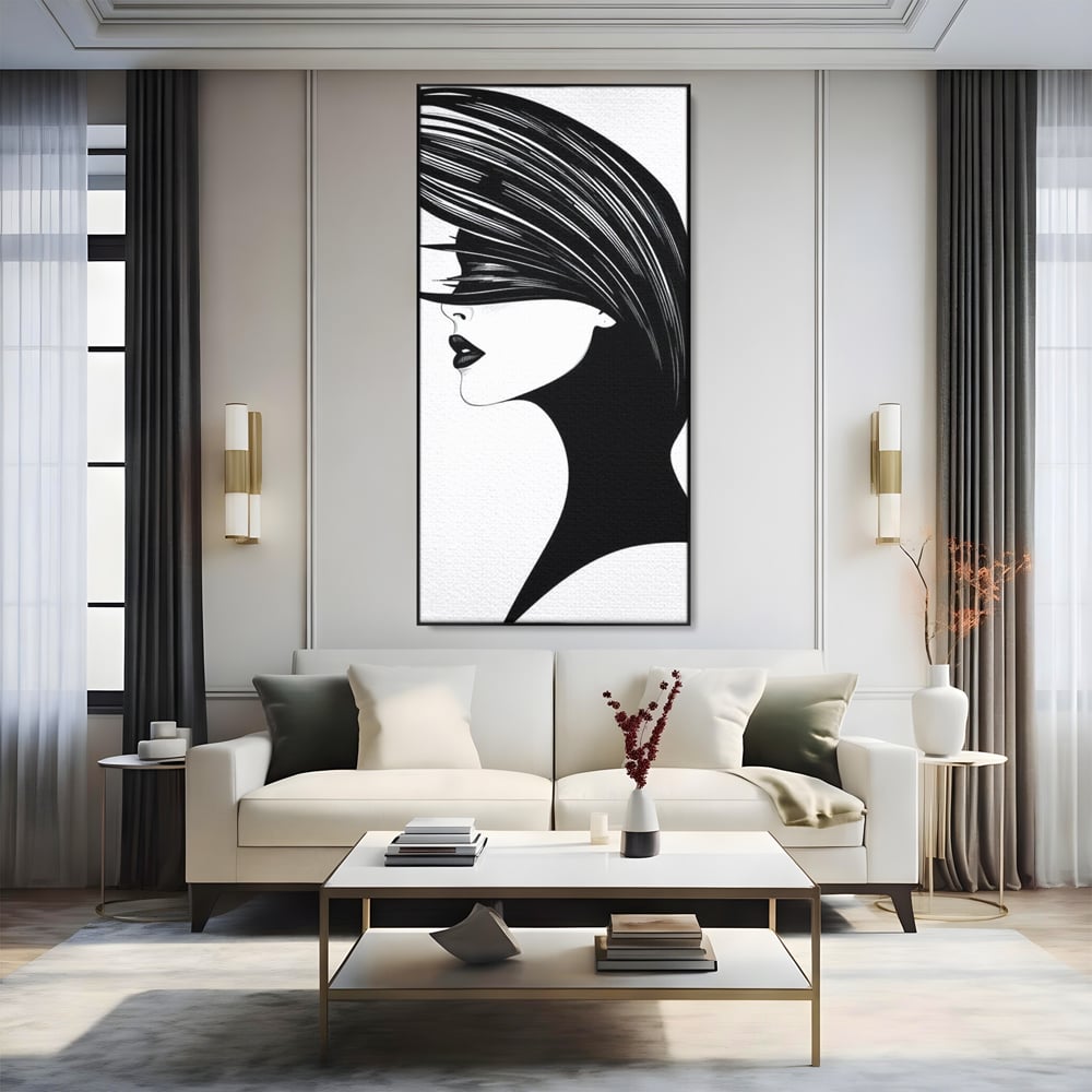 Tablou canvas cu ilustratie cu profil de femeie in alb si negru, in rama de aluminiu negru, pe perete intr-un living